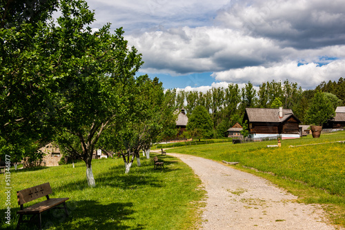 Skansen with wooden village houses near Sara Lubovna Castle in Slovakia at summer © marcin jucha