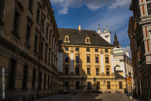 Fototapeta Naklejka Na Ścianę i Meble -  Old buildings with sunlight on urban street in Wroclaw