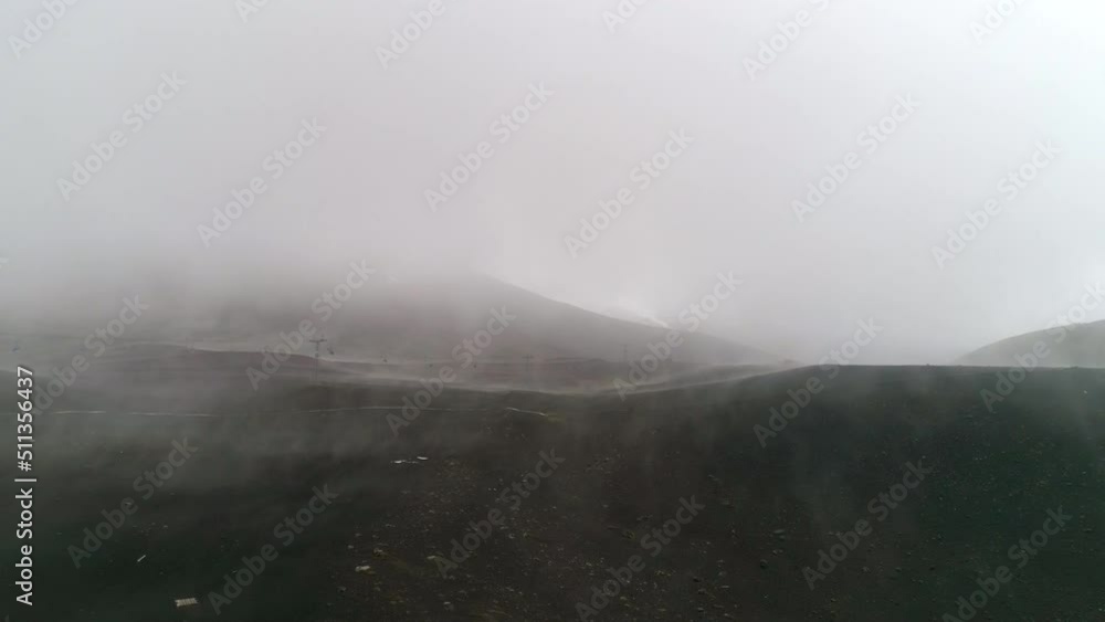 Aerial: Ski Lifts During Foggy Weather, Drone Flying Backwards Over Natural Landscape - Puerto Montt, Argentina Aerial: Ski Lifts During Foggy Weather, Drone Flying Backwards Over Natural Landscape - Puerto Montt, Argentina