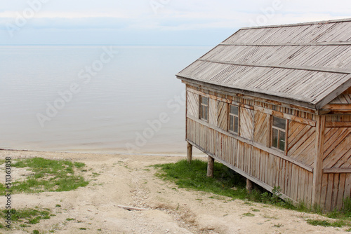 Old wooden country house on the shore © Stanislaw Mikulski