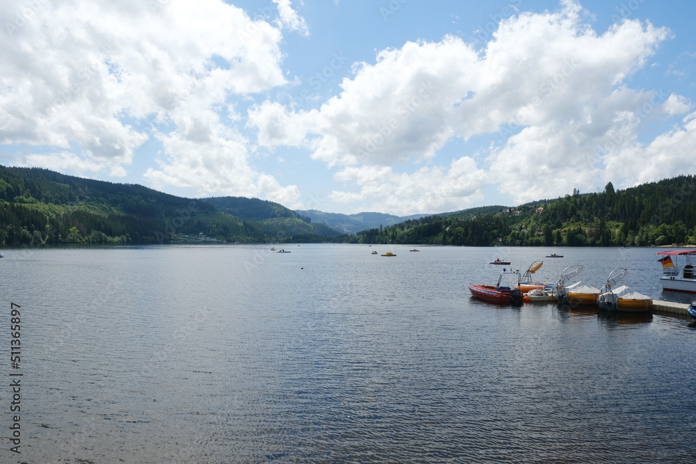 A panoramic view of Titisee Lake at Black Forest region with several boat insight. Part of tourist attraction in German