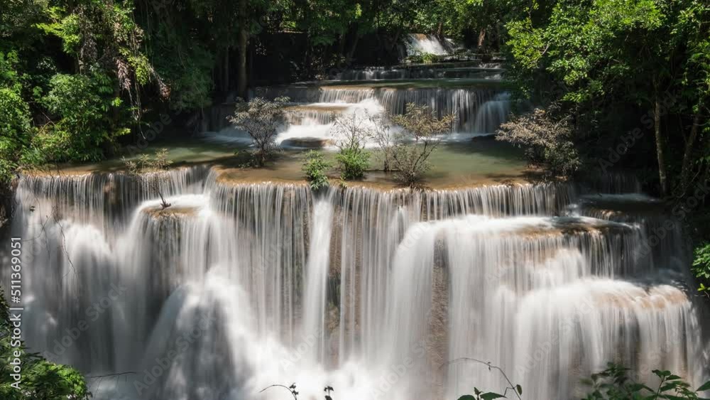 Time lapse of Huay Mae Khamin waterfall flowing in tropical rainforest at 4th floor landmark on national park Time lapse of Huay Mae Khamin waterfall flowing in tropical rainforest at 4th floor landmark on national park