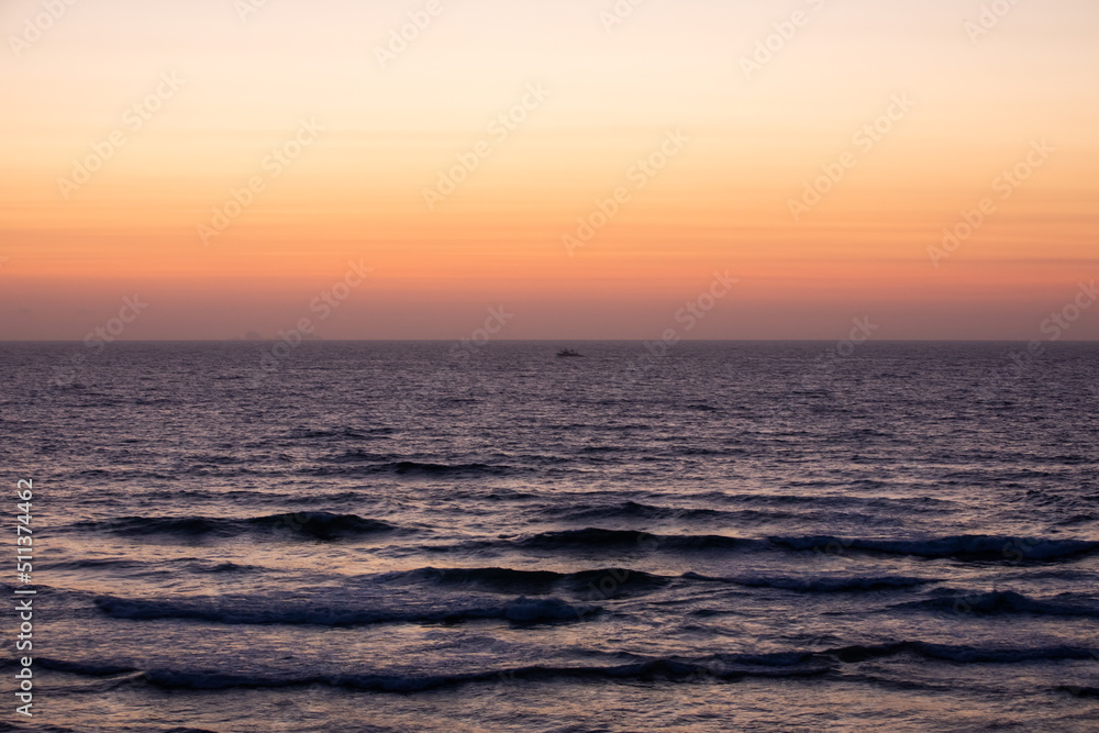 Praia dEl Rey and the Atlantic Ocean, Portugal at sunset 