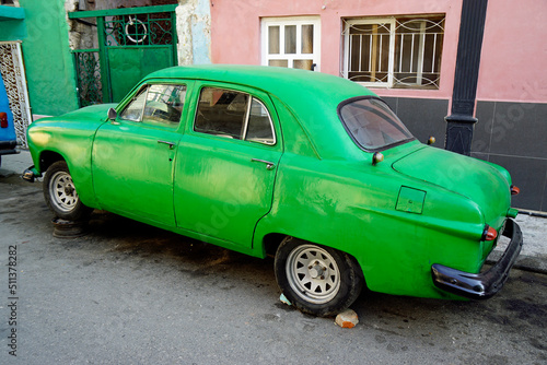 old green car in the streets of havana