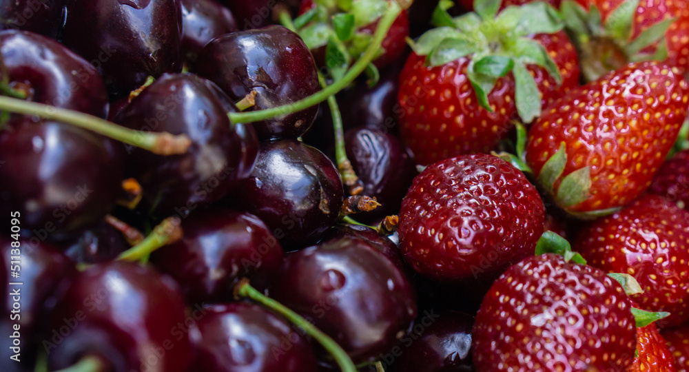 cherries and strawberries in store cherries and strawberries in store