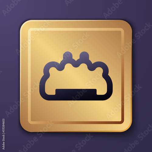 Purple Brass knuckles icon isolated on purple background. Gold square button. Vector