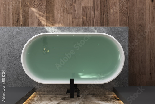 Top view of white bathtub full with water, black faucet, concrete platform and beautiful parquet floor in minimalist bathroom. 3d Rendering photo