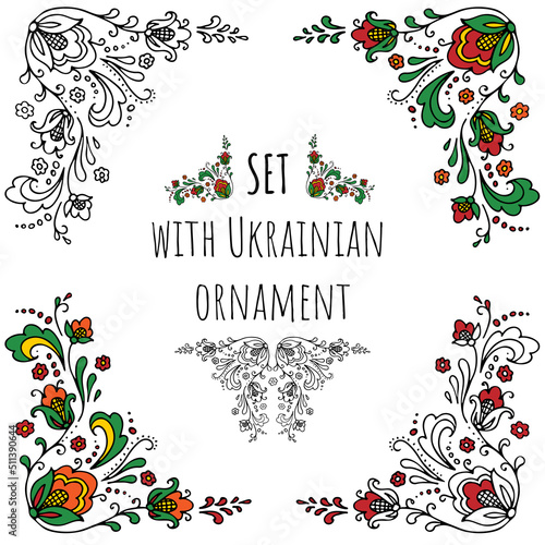 Ukrainian ornament from a branch of decorative orange-red flowers with green leaves photo