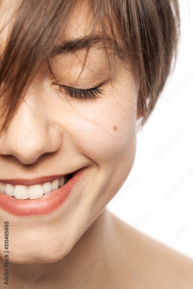 Beautiful girl fashion portrait. Smiling with eyes closed. . Beautiful girl fashion portrait. Smiling with eyes closed. .