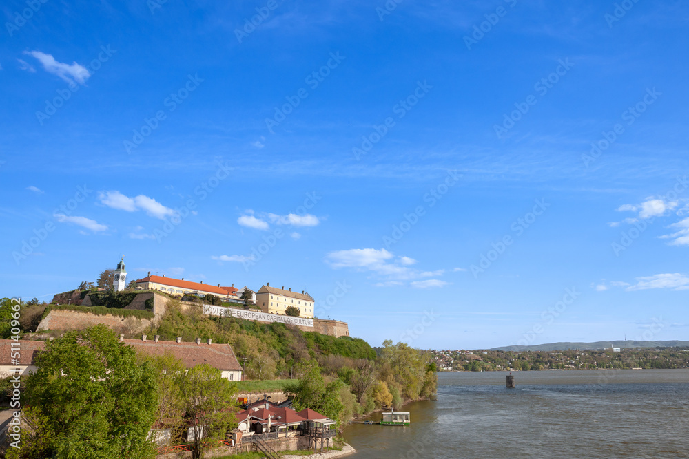 Petrovaradin Fortress in Novi Sad, Serbia by the danube river. This castle is one of the main landmarks of Novi Sad and Voivodina, with a banner indicating novi sad is the european capital of culture