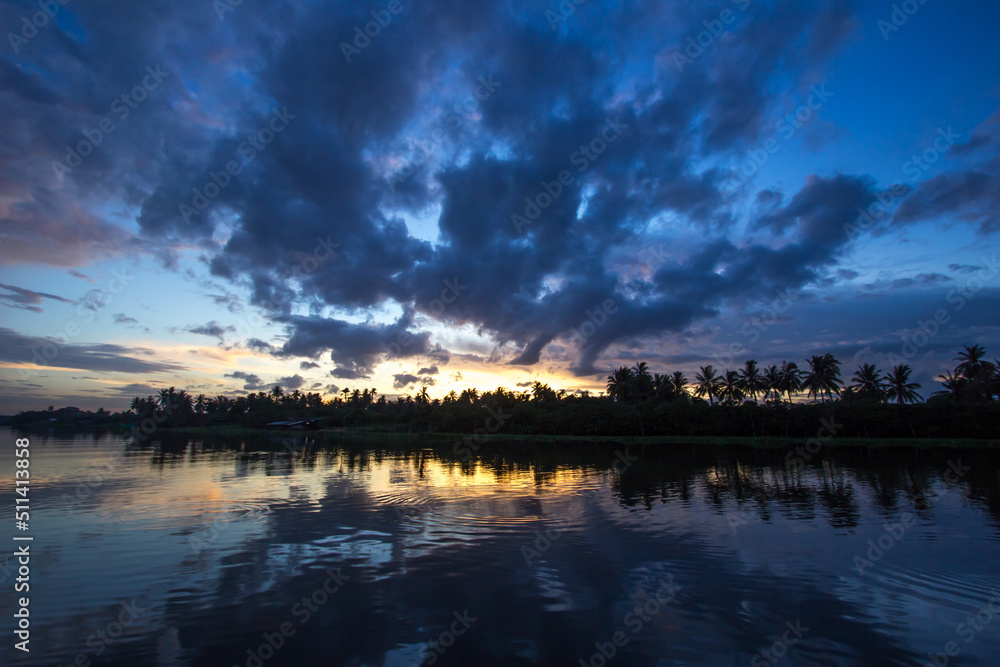 Twilight sky and countryside view along Tha Chin river(Maenam Tha Chin),Nakhon Pathom,Thailand