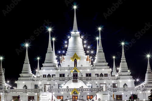 Night scene of Phra Thutangkha Chedi in Asokaram Temple,Samut Prakan Province,Thailand.