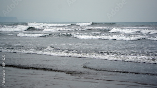 Waves breaking on the beach in Canoa, Ecuador