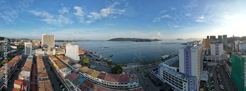 Kota Kinabalu, Sabah Malaysia – June 14, 2022: The Waterfront and Esplanade Area of Kota Kinabalu City Centre photo