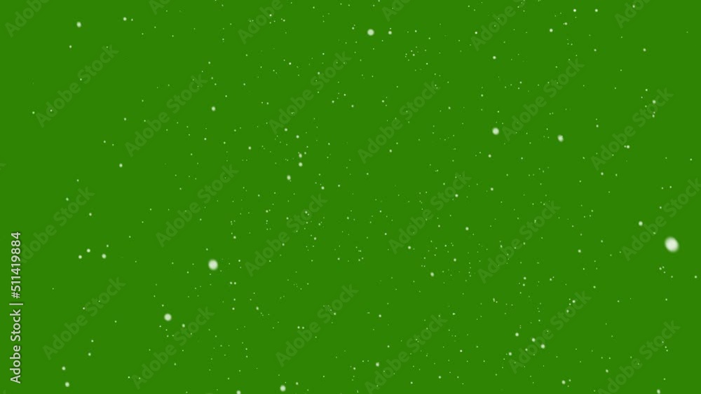 Snow falling on green background Snow falling on green background