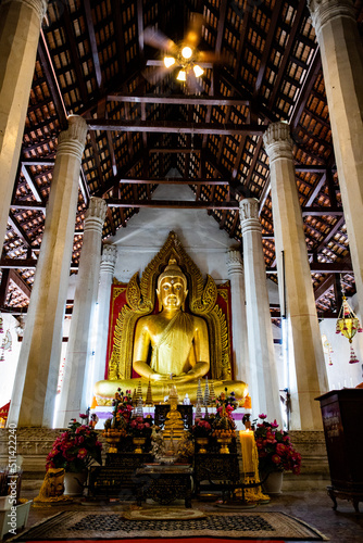 The old golden Buddha statue at Wat Lai, Buddhist temple in Lopburi, Thailand.