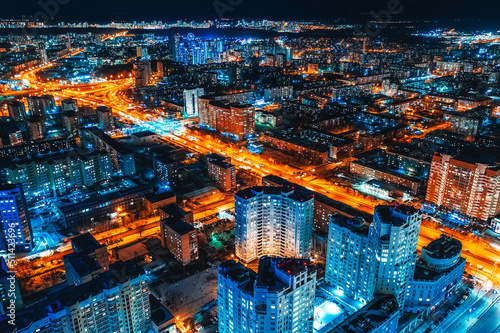 Top view of the night modern city. Bright lights of the night streets. Ekaterinburg. Russia