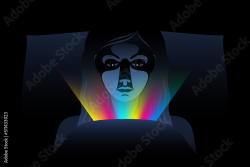 Woman is sitting under blanket on bed at night and watching something on phone
