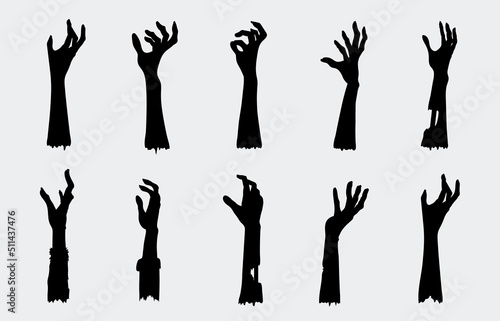 Silhouettes of Zombie hands collection in a rise up pose isolated on white. Graphic resource for spirit, Halloween, and fantasy.