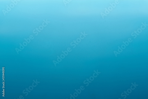 concept burred blue calm water texture background 