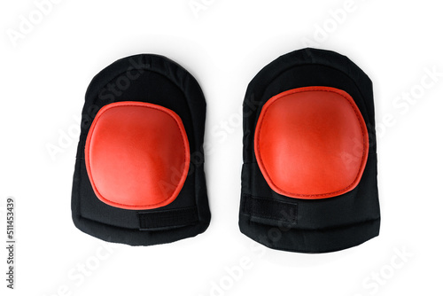 Orange knee pads isolated on white background.
