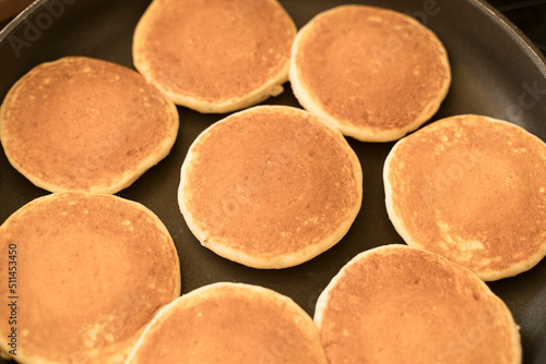 Pancakes in a pan. Delicious homemade pancakes background cooking for breakfast or lunch