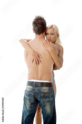 Young Girl is Holding Him Against Isolated White Background