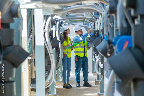 Bilde på lerret Engineer under checking the industry chilled water fan coil unit air conditioner