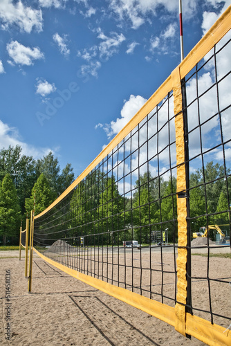 yellow beach volleyball net outdoors