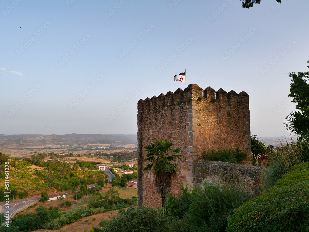 Fortress tower with templar flag in Spain Fortress tower with templar flag in Spain