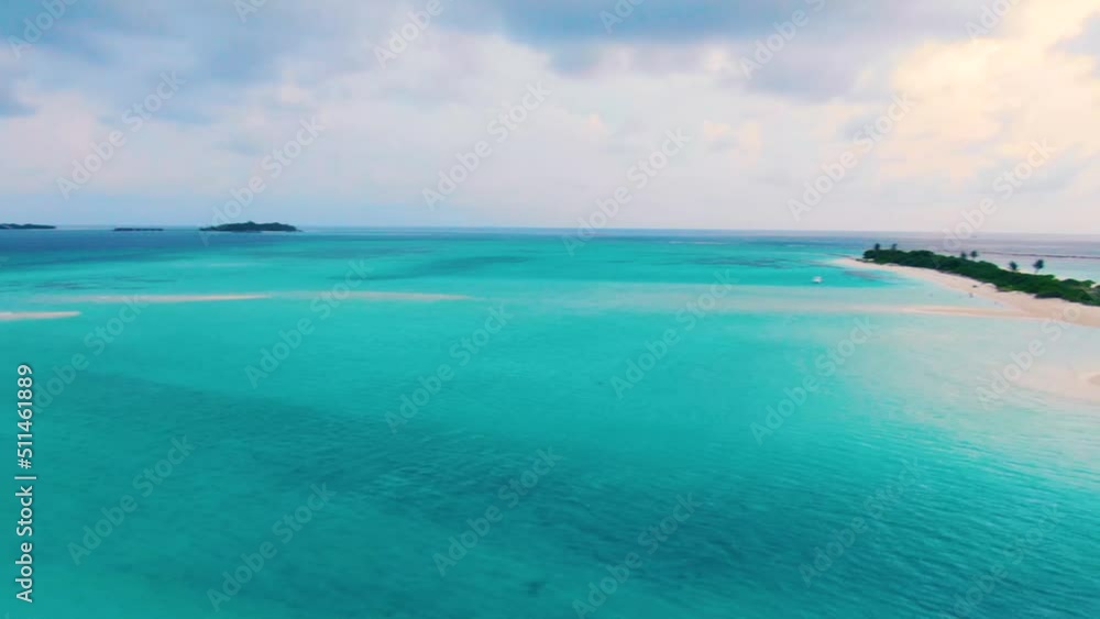 Drone flyuing along Maldive paradise tropical island Drone flyuing along Maldive paradise tropical island