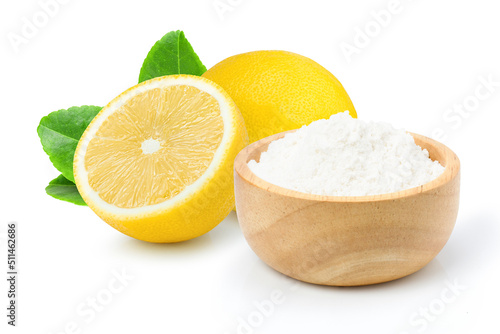 Baking soda or sodium bicarbonate powder and fresh lemon fruit isolated on white background.
