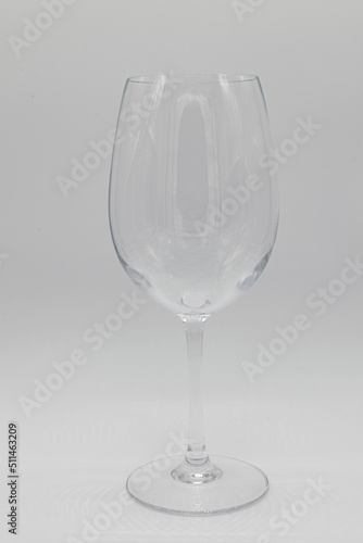 empty wine glass on white background.