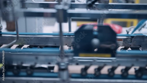 Wallpaper Mural Tracking shot, packaging printing line in printing house. Torontodigital.ca