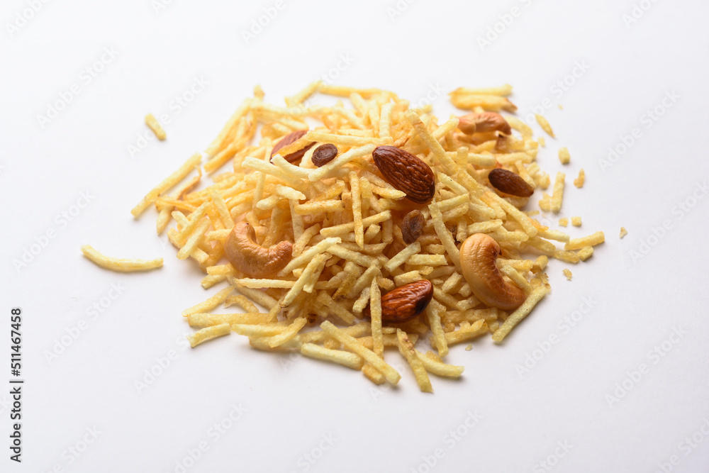 Indian style deep fried snacks falahari chivda, Chewda - chivda or mixture namkeen with dry fruits Indian style deep fried snacks falahari chivda, Chewda - chivda or mixture namkeen with dry fruits