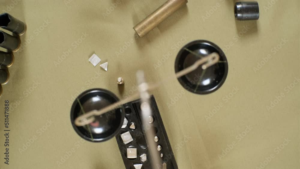 shotgun cartridges reloading. capsules, shells, powder, cartridges, scales on the table shotgun cartridges reloading. capsules, shells, powder, cartridges, scales on the table