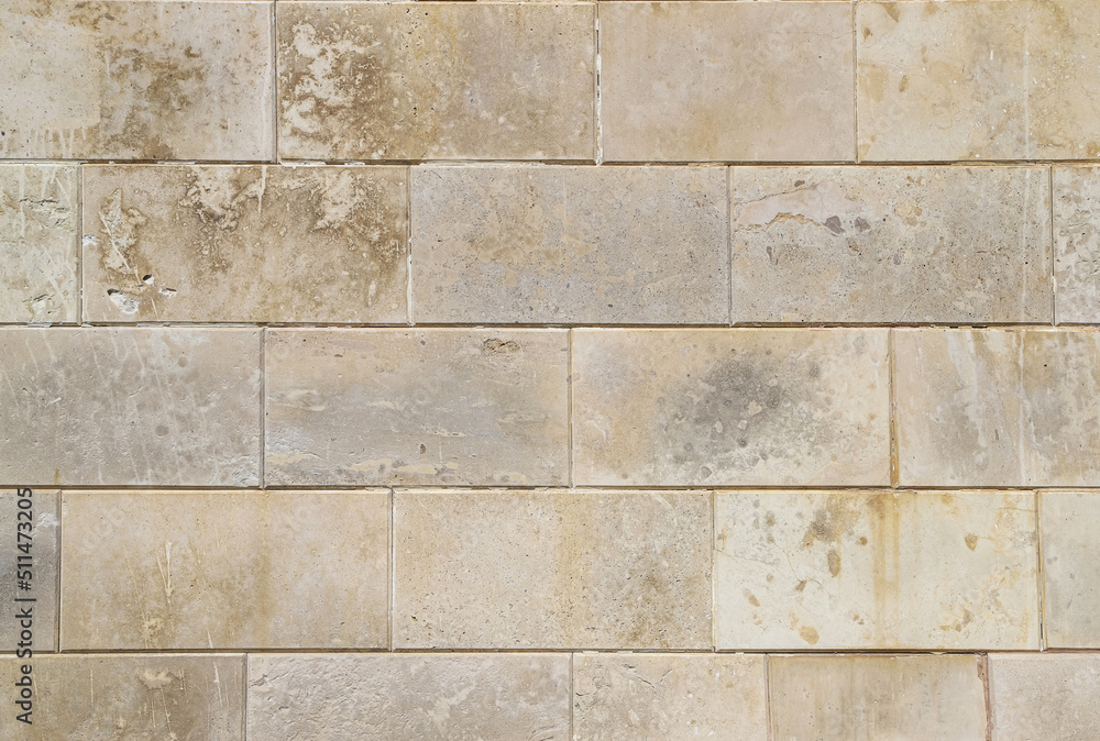 Fototapeta premium Wall made of natural stones as a background