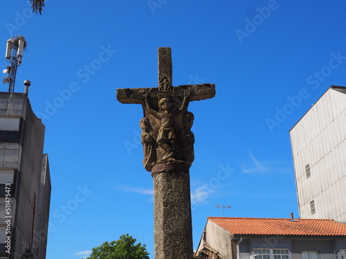 cruz con cristo crucificado en majestad, flanqueado por maría y el apóstol san juan, mellid, la coruña, españa, europa photo