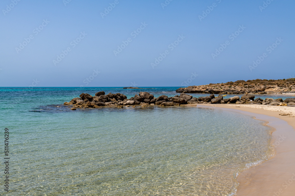 The beautiful turquoise water and natural breakwaters at Neve Yam public beach in Atlit Israel
