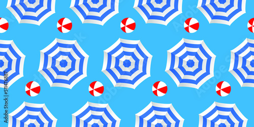 Beach background. Beach umbrellas and balls as summer pattern