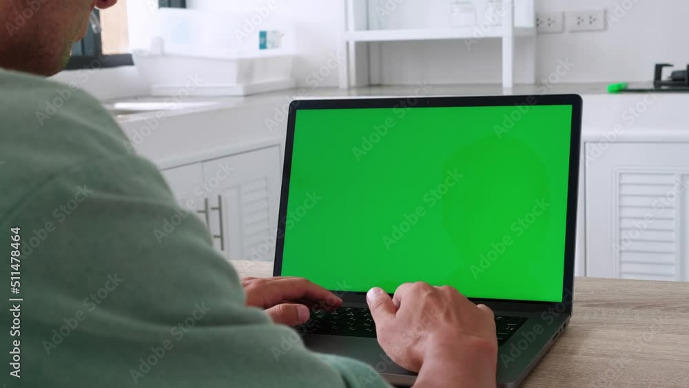 Rear view caucasian man use computer male hands keyboarding texting laptop green screen chroma key keyboard device working message student businessman Rear view caucasian man use computer male hands keyboarding texting laptop green screen chroma key keyboard device working message student businessman