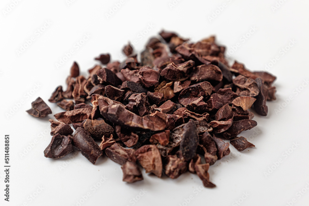 cacao nibs on a white background cacao nibs on a white background