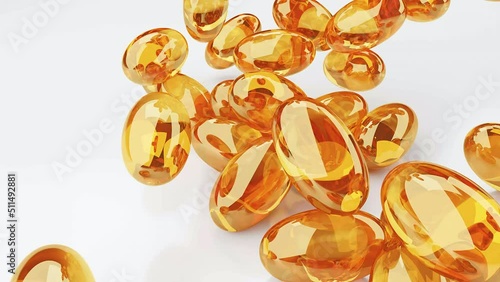 Soft gelatin capsules for containing oily drugs and nutritional supplements like vitamin A, and E. 3D rendering motion close up. Fatty fish oil supplements. photo