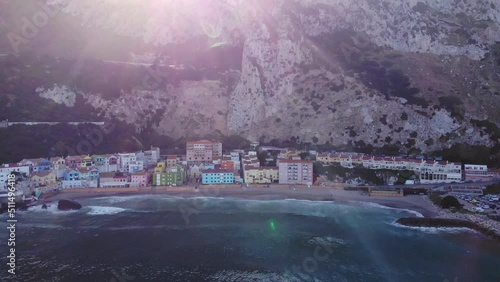Idyllic Seafront Village Of Catalan Bay During Summer In The British Territory Of Gibraltar. Aerial Drone Shot