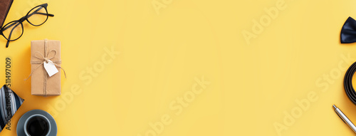 Father's day gift idea design concept with gift box on yellow background.