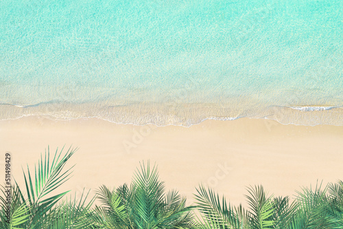 Fototapeta Naklejka Na Ścianę i Meble -  Top and aerial view on tropical sand beach, palm tree and sea. Ocean coastline. Drone photo. Background. Copy space