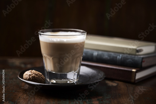 Coffee with milk on dark wooden background. Soft focus. Copy space.	