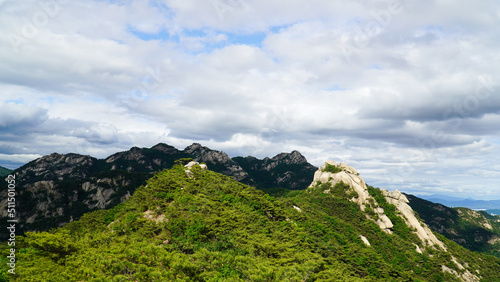 The grandeur of the mountain peaks and clouds of Bukhansan Mountain