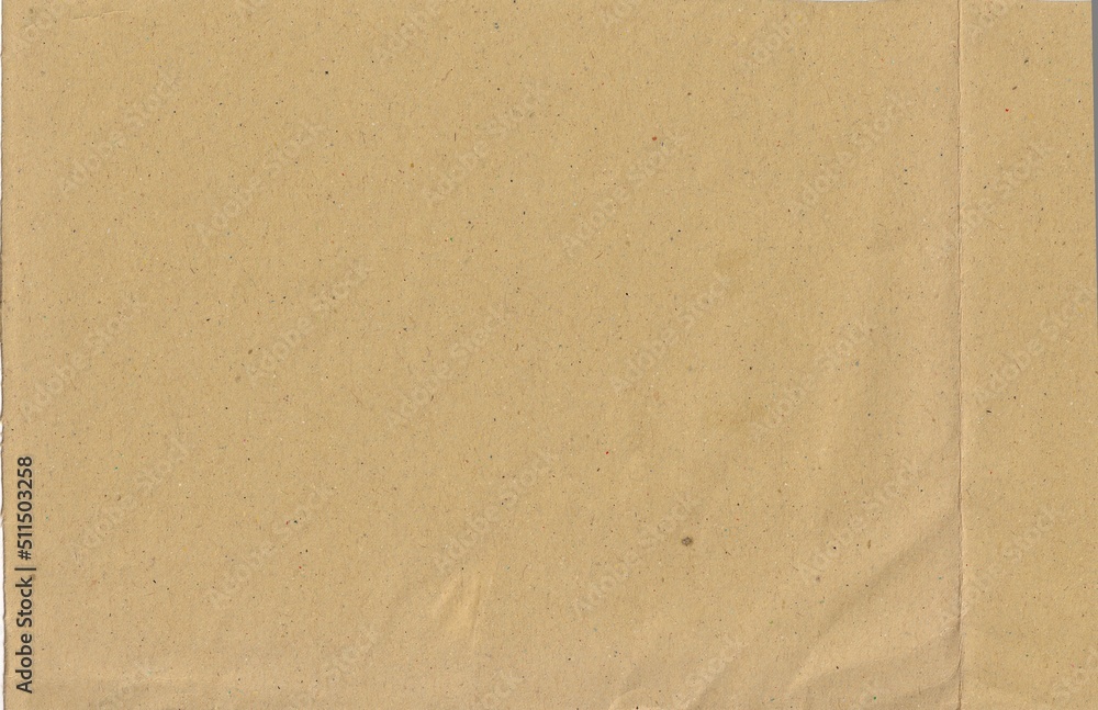 Brown paper texture for background. Close up of old paper surface. Grunge texture from recycle paper bag Brown paper texture for background. Close up of old paper surface. Grunge texture from recycle paper bag