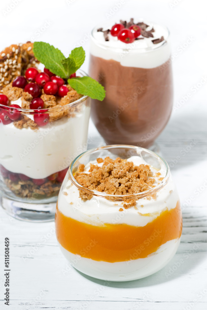 desserts with pumpkin, chocolate and biscuits, vertical closeup desserts with pumpkin, chocolate and biscuits, vertical closeup